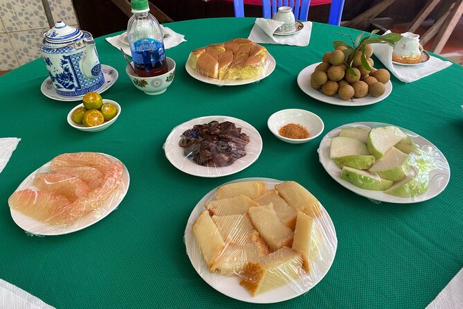 1-Day Explore Non-Touristy Side Of Mekong Delta- Group 10 Max - The 4 km bike ride, Ut Trinh Homestay lunch, and coconut charcoal photos