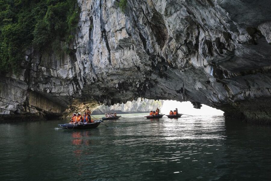 2-Day Ha Noi - Ninh Binh - Ha Long Bay Highlights Tour - Titop Island beach time, Titop peak photos, and the sunset party onboard
