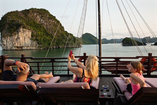 2D1N: Halong Bay 4-Star Cruise - Cave, Kayak, Swim, Meals - Day 2 early morning: Taichi at 6:15, breakfast soon after, then Sung Sot Cave