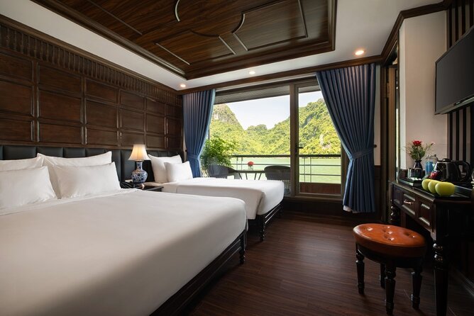 3 Day/2 Night Halong-Lan Ha Bay 5 Star Cruise with Balcony Cabin - Day 2: Sunrise Tai Chi, Day Boat Transfers, and Kayak-First Cave Time