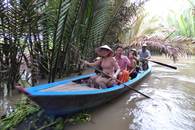 9-Day Tour of Vietnam with Airport Pick Up - Mekong Delta day trip: boat time, fruit stops, and Ben Tre coconut candy