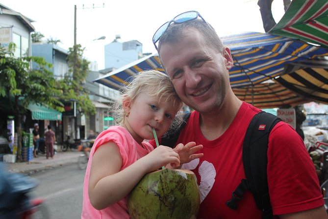 Afternoon Saigon Unseen Adventure by Scooter |Opt: Ao Dai Riders - Ho Thi Ky Flower Market, grilled oysters, and the smell test