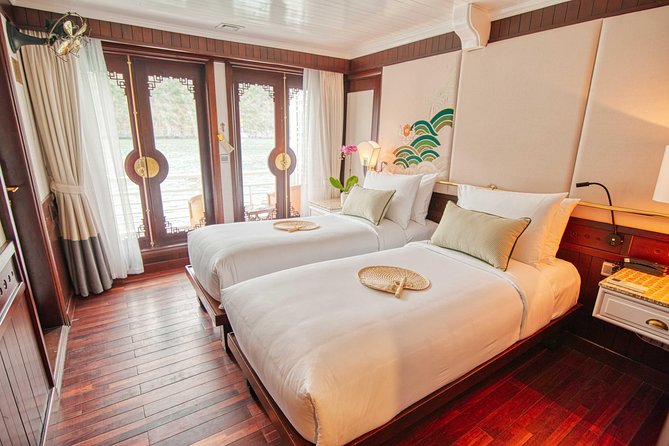 All Inclusive 3-Day 2-Night explore Ha Long Bay with Au Co Cruise - Day 2: Trinh Nu kayaking, Cua Van floating village, then ship downtime