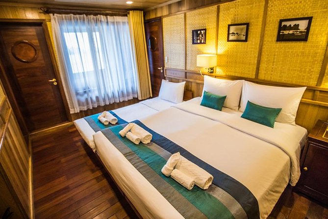 All inclusive Bhaya 2-Day Halong Bay Tour - Day 2: Tai Chi on deck, Sung Sot Cave, and brunch by the water