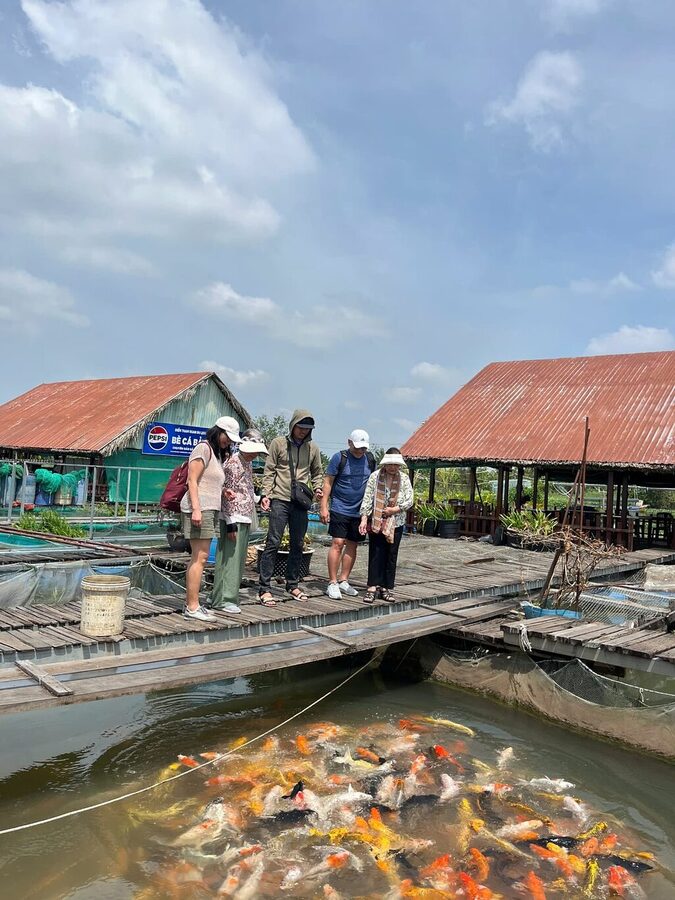 Authentic Mekong Delta: Tuk Tuk, Rowing Boat, Biking Tour - Stop in Ben Tre: fruit gardens, folk music, and village pace