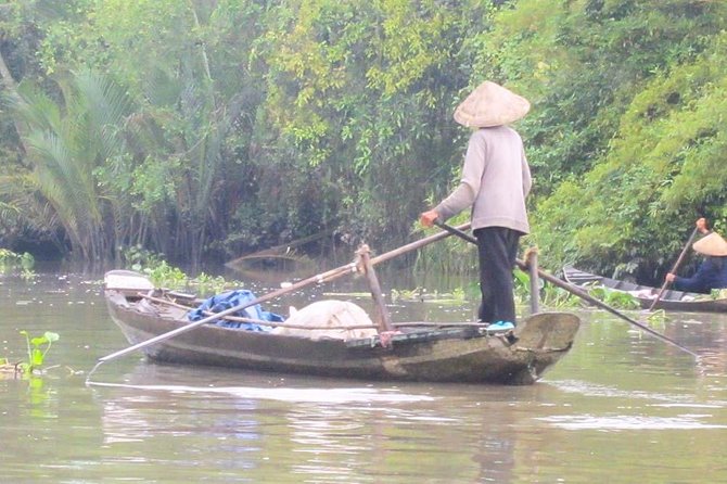 Authentic Mekong Delta: Tuk Tuk, Rowing Boat, Biking Tour - Getting there: Pickup, meeting point, and what the day schedule feels like