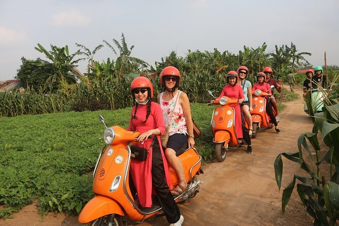 Beautiful Female Riders Vespa Red River Countryside Tour 5 Hours - Long Bien Bridge: the quick stop that sets the day’s tone