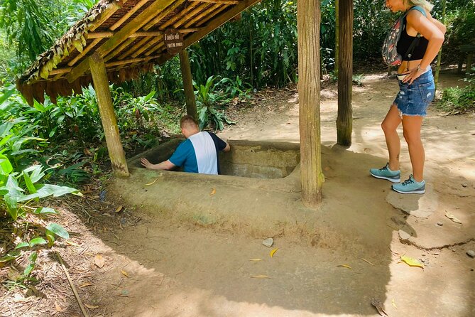 Ben Duoc 'Less-Crowded' Cu Chi Tunnels Half-Day Tour - What you do underground: traps, an ex-US tank, and the crawl itself