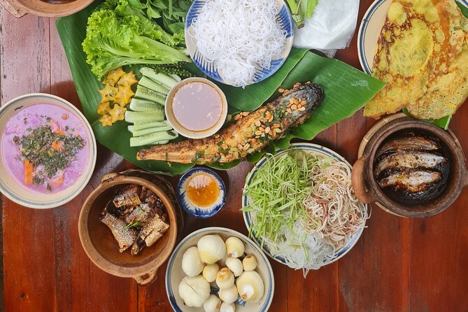 Ben Tre Mekong Zig Zag: Scooter, Sailboat, and Food (Full day) - Ben Tre city street food and a market stop you can taste with confidence