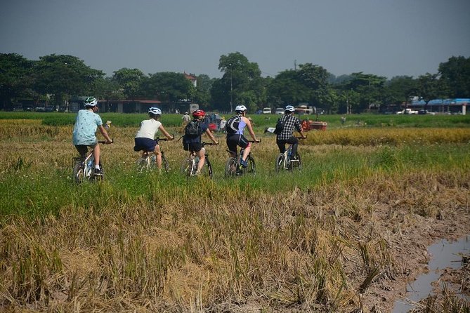 Bicycle Tours Hanoi: Full Day Bicycle Tours City & Countryside - Hữu Tiệp Lake and the downed B-52: quiet, meaningful, and not rushed