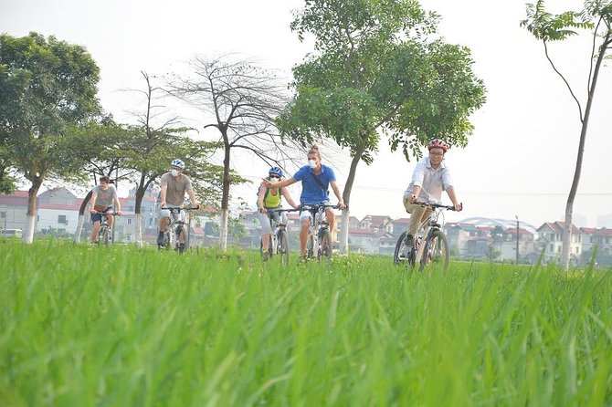 Bicycle Tours Hanoi: Full Day Bicycle Tours City & Countryside - Dường Tau and Co Loa: tracks, wet markets, and sugarcane breaks