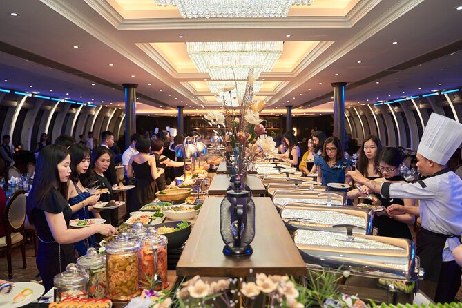 Buffet on Paradise Delight Dining Cruise Halong Bay Tour - Stop by stop: the grotto with stalactites, stalagmites, and colored lighting