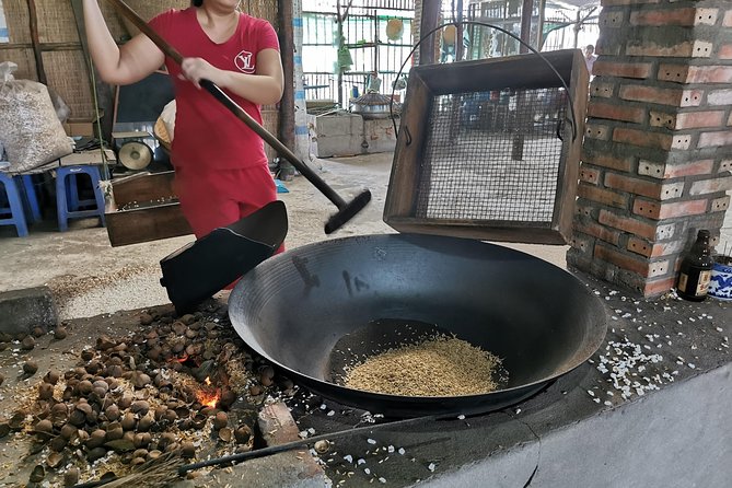 Cai Be Village - One-Day Mekong Delta Adventure - Bike along the paddy road, then the 30-minute paddle boat through scissor channels
