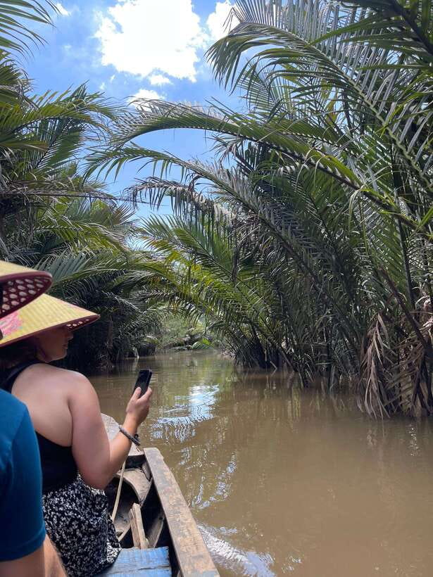Can Tho: Floating Market, Canal, Cacao Farm & Mekong' Life - River breakfast: noodles, bread, and pineapple on the go