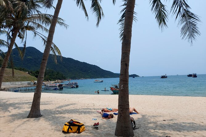 Cham Island Snorkeling Daily Group Tour, Sunbathing, nice beaches - A quick culture pause at Non Nuoc stone carving