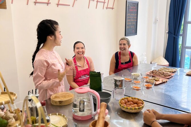 Cook 4 Local Vietnamese Dishes In Pink-themed Class & Market Tour - District 1 and a pink studio, with real-market start