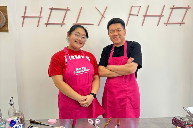 Cook 4 Local Vietnamese Dishes In Pink-themed Class & Market Tour - The team, Eva and Kelsey, and how the class feels