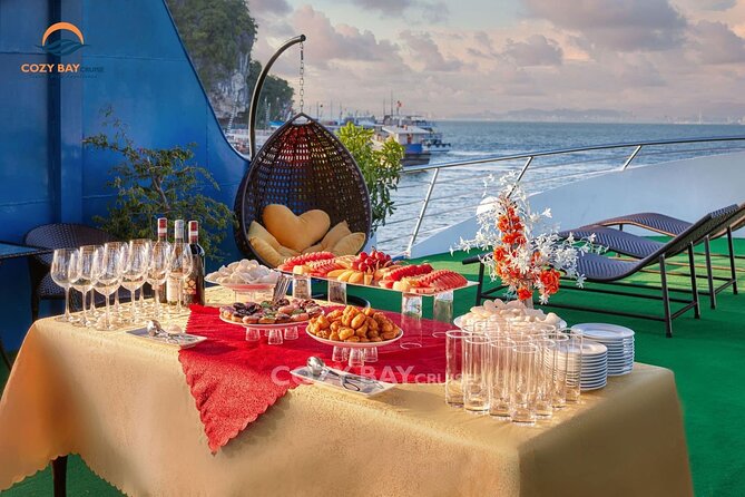 Cozy Bay Halong 5-Star Day Cruise, Buffet, Cave, Kayak, Swimming - Buffet lunch and onboard sunset party: the best included meals on a day cruise