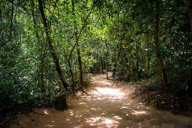 Cu Chi Tunnels Half-Day Tour: Vietnam War Underground Network - Ben Duoc tunnel complex: documentary first, then real underground history