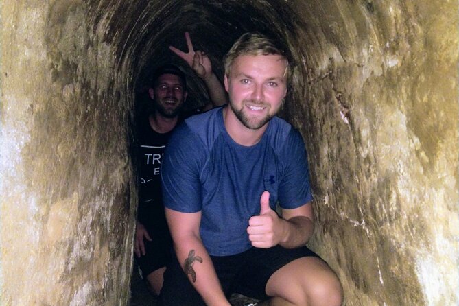 Cu Chi Tunnels tour In The Morning by DGT - The tunnel experience: tight openings, heat, and guided safety