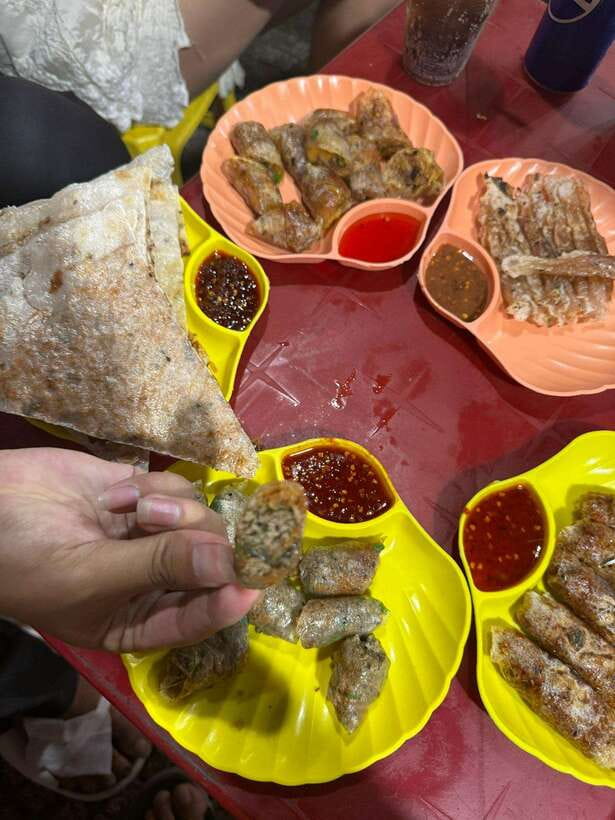 Da Nang City Street Food Private Tour With Local Students - City sightseeing you might catch, including Dragon Bridge photos