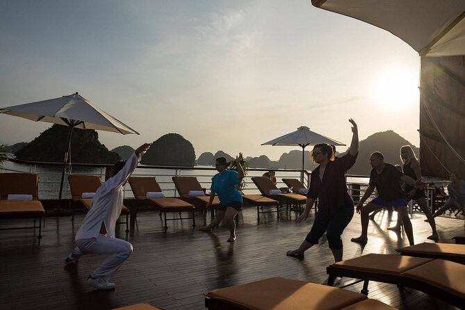 Discover Ha Long Bay in 2 Days and 1 Night Cruise Experience - A floating home on a traditional wooden junk