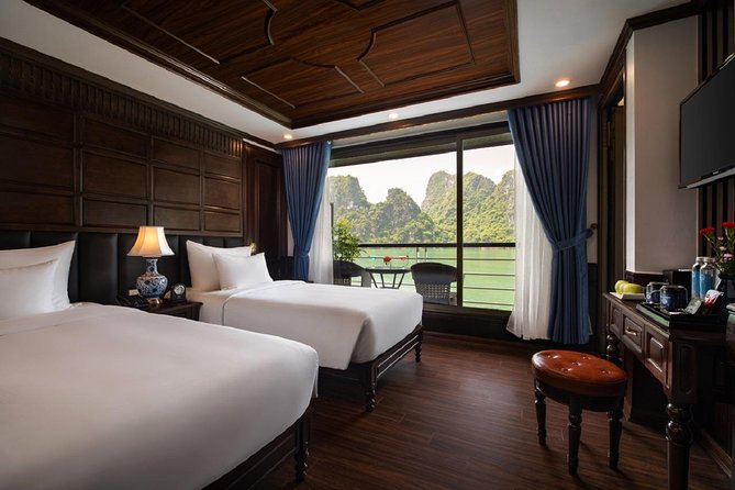 Doris Cruise 5 star cruise 3 days visiting Halong - Lan Ha Bay - Day 2: Viet Hai Village, sunrise Taichi, then biking