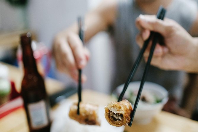 Eat Like a Local: Hanoi Street Food Adventure - Hoan Kiem Walking Street and the café with lake views