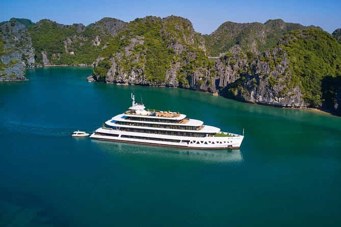 Emeraude Cruise 2 days 1 night Ha Long Bay Tour - The onboard evening: dinner, squid fishing, movies, and deck-time extras
