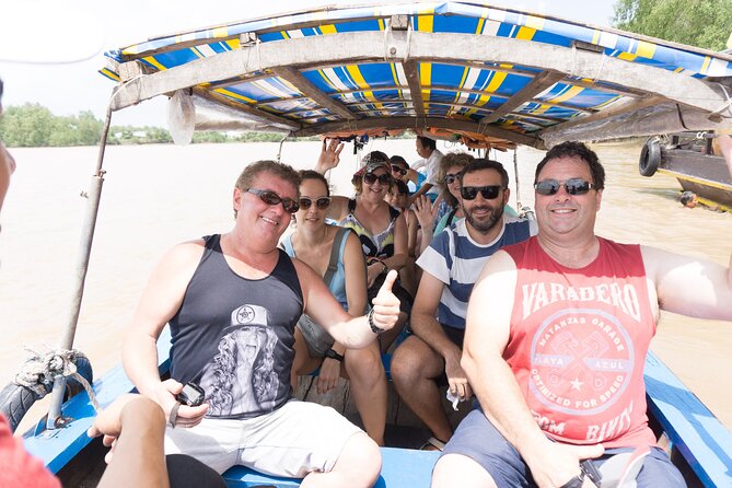 Essential Mekong Delta: Highlights Tour from Ho Chi Minh City - Tan Thạch Sampan Ride, Honey Tea, and Coconut Candy Hands-On