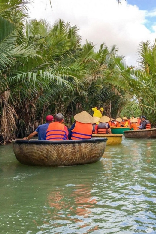 Experience Bamboo Basket Boat on Coconut village w Locals - Water show moments: Nets, spins, and karaoke volume