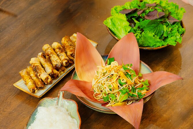 Experience Hanoi Cooking Class with Free Wine Tasting - From Đồng Xuân Market to Your Cutting Board