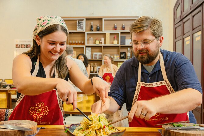 Experience Hanoi Cooking Class with Free Wine Tasting - Cooking Four Iconic Dishes the Vietnamese Way
