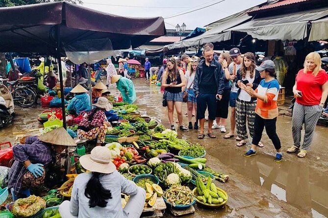 Experience Local Market and Boat Ride with Cooking Class - Guide energy: why the experience feels fun, not just educational