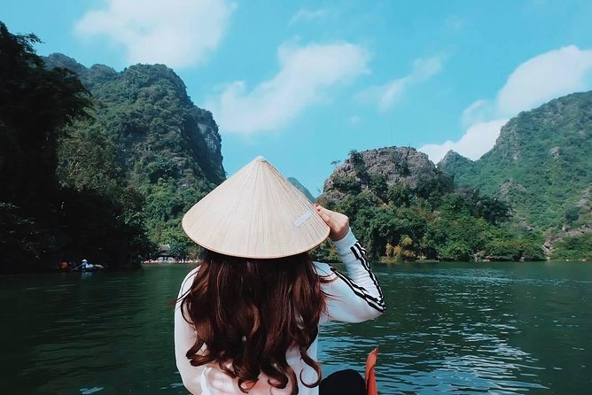 Exploring Bai Dinh Pagoda -Trang An -Mua Cave with Buffet Lunch 1 Day From Hanoi - Trang An eco-tourism boat ride: caves, calm, and famous names