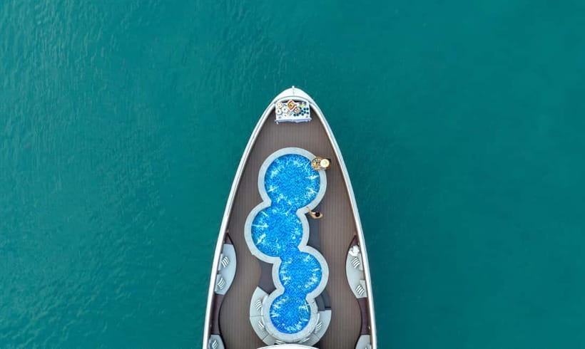 From Ha Long: Luxury Symphony Day Cruise with 2 Jacuzzi Pool - Surprise Cave (Sung Sot) at 11:45, rock formations and guided pacing