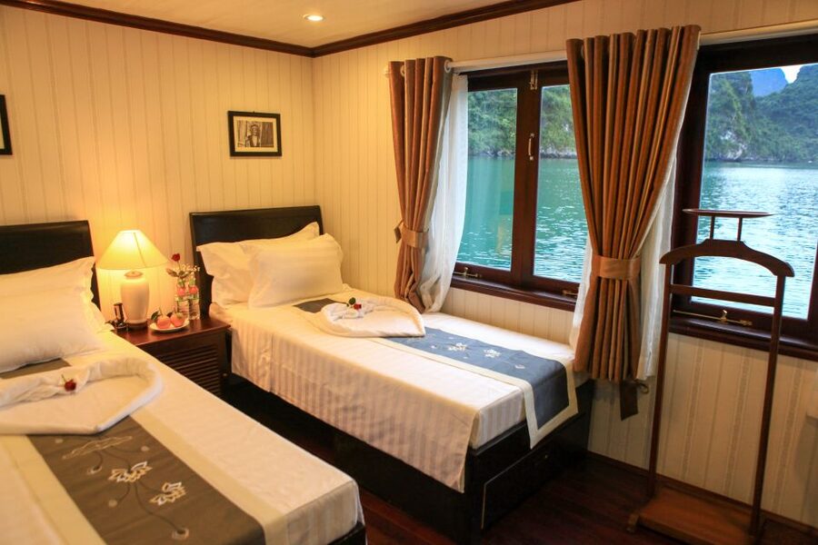 From Hanoi: 2-Day & 1 Night Halong Bay Tour - Night on board: sunset deck, squid fishing option, and a quieter kind of luxury