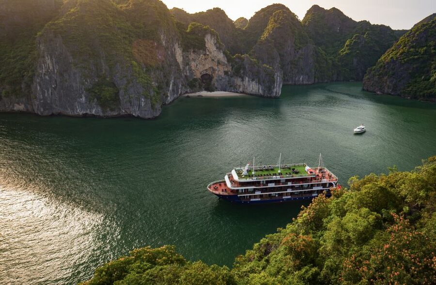 From Hanoi: 2-Day Halong and Lan Ha Bay La Pandora Cruise - Day 2: Dark and Bright Cave by local rowing boat