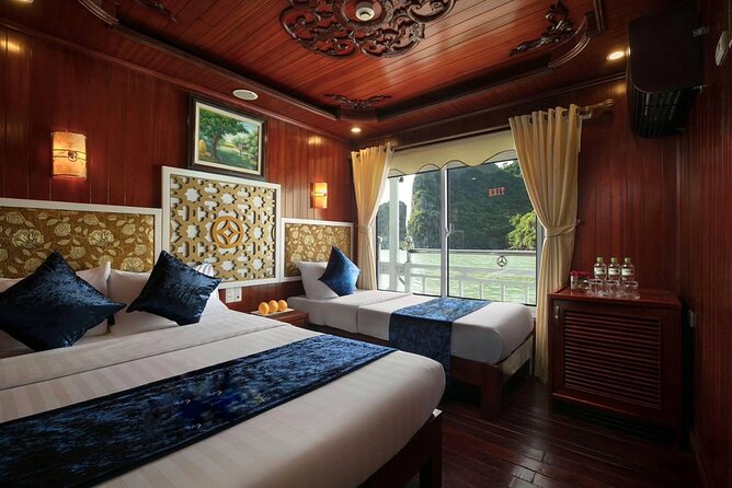 From Hanoi: 2D1N Ha Long Bay Deluxe Cruise with Bus Limousine - Check-in at the harbor and lunch on the boat