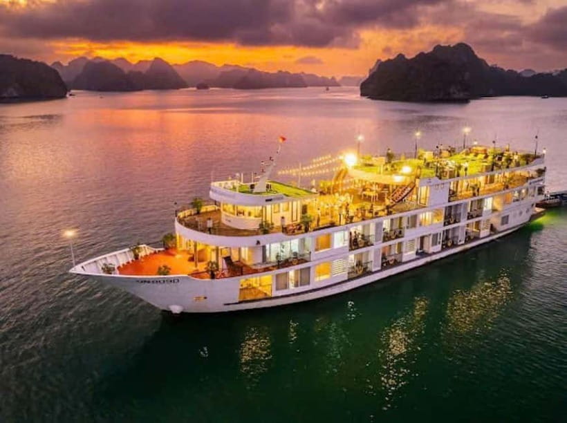 From Hanoi : 4-day Ninh Binh-Halong Bay Cruise with Balcony - Day 3: Transfer to Halong Bay, Titop Island swim, then a sundeck sunset party and cooking class