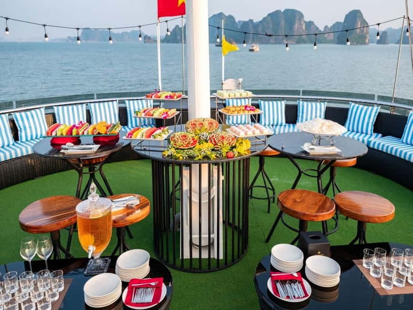From Hanoi: Halong bay Luxury tour on 5 star cruise - TiTop Island: swimming, a viewpoint hike, and a breather