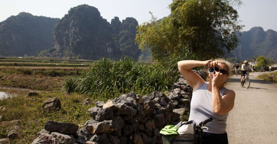 From Hanoi: Hoa Lu & Tam Coc with Buffet lunch & Cycling - Tam Coc sampan boat ride: karst caves, river views, and that special rhythm