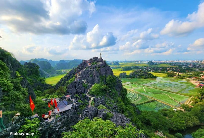 From Hanoi: Tam Coc Boat Trip and Hoa Lu & Mua Cave Tour - Tam Coc bamboo boat trip: three caves, karst passes, and why it feels special