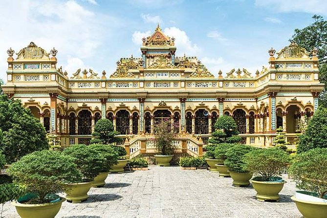 From HCM City: Mekong Delta Tour with Sampan Journey - Unicorn Islet: Village Walk, Fruits, Honey Tea, And Folk Music