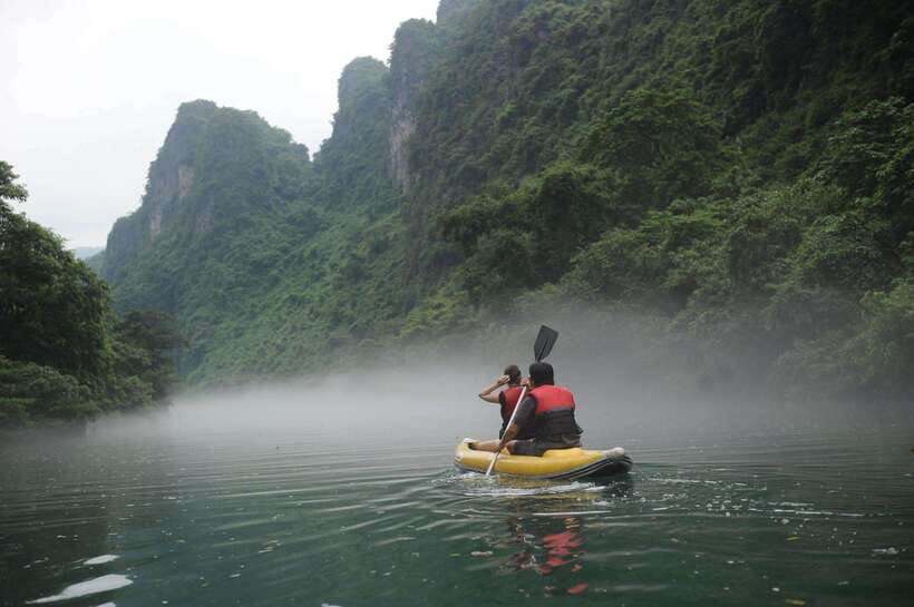 From Phong Nha/DongHoi: Paradise Cave and Zipline Dark Cave - Kayaking, Paddles, and Moving Through a Different World