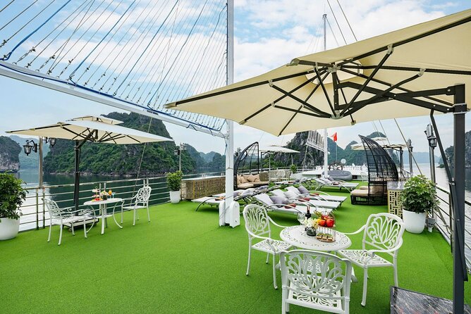 Full day Halong Bay Luxury Cruise - buffet lunch, kayak, swim. - Luon Cave area: kayaking with the limestone-cliff view