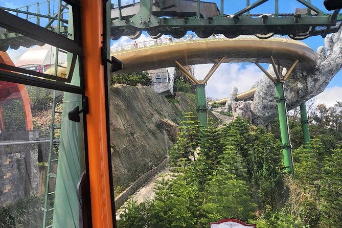 Golden Bridge - Monkey Mountain- Marble Mountains - Dragon Bridge - Riding the cable car: the easy way up the mountains