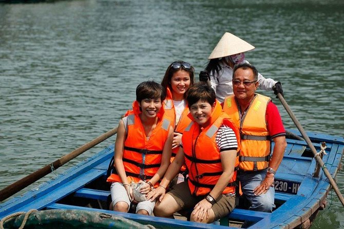 Group Halong Bay Day Cruise Including Hotel Transfers from Hanoi - Halong Bay cruise: limestone islands and floating village context