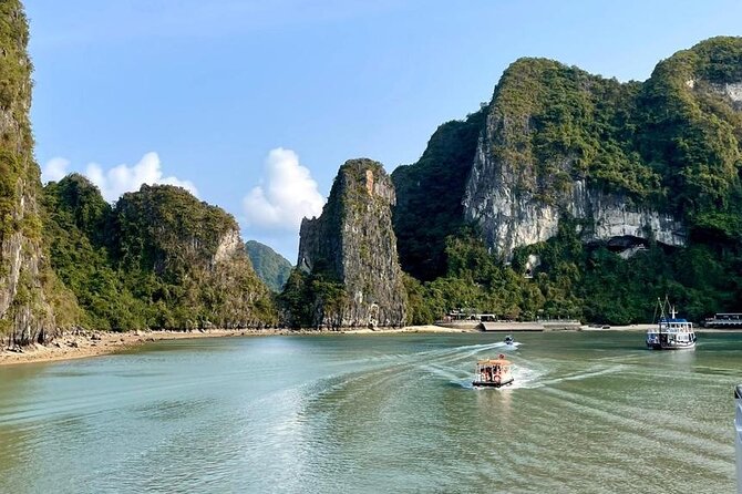 Ha Long Bay Day Cruise From Ha Noi - Surprising Cave and Luon Cave: stalagmites, sea life shapes, and a paddle option