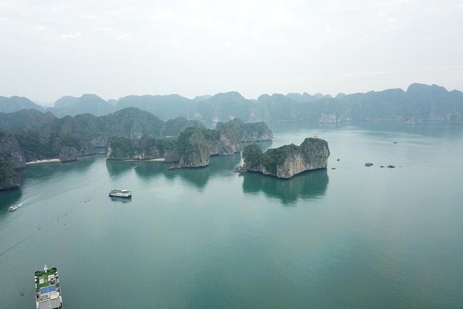 Ha Long Bay Six Hours Trip Kayaking & Swimming on Beach - Swimming on the beach and the mountain climb for a real payoff